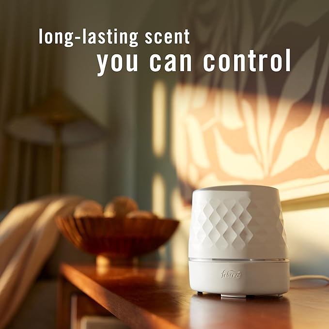 Febreze Plug Scent Booster Starter Kit, Oil Diffuser, Air Freshener Plug in, Continuous Scent Device + 2 Downy Calm Refills